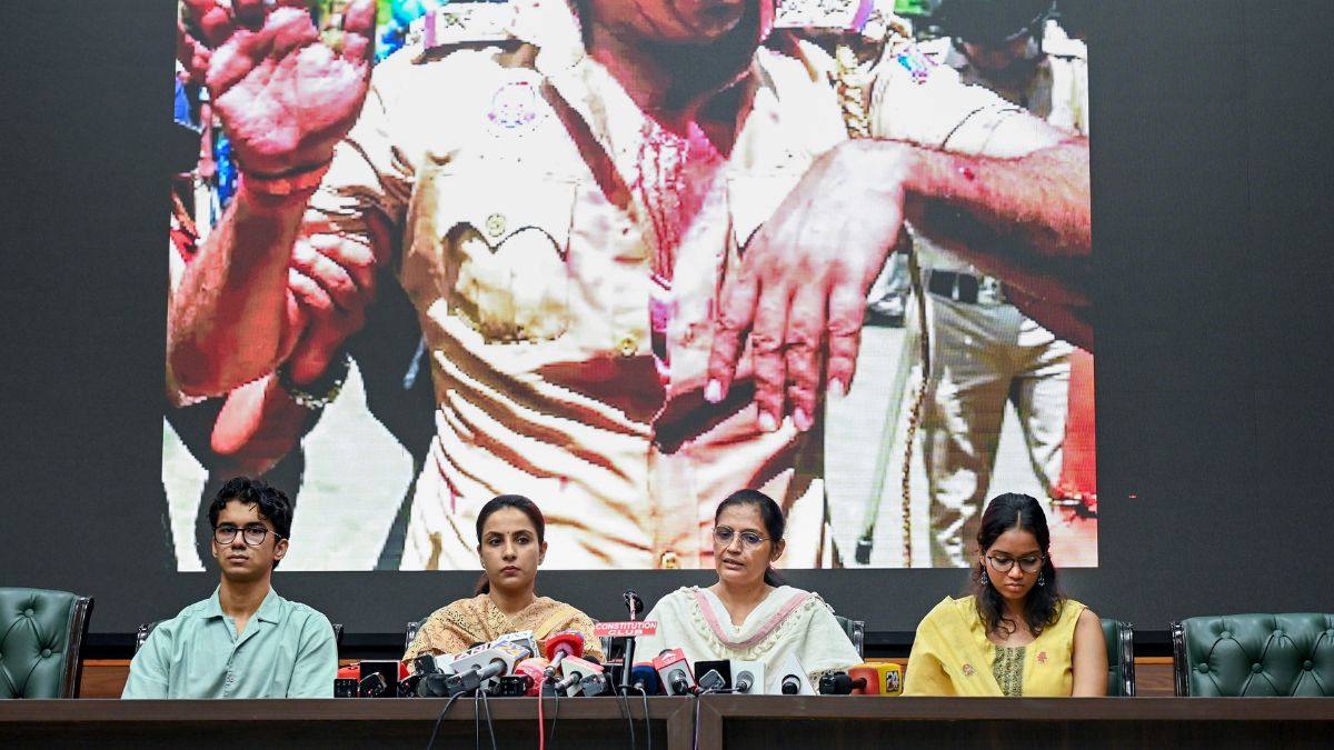 Family members of police personnel, who were injured during the protest march led by Cockroach Janata Party (CJP), during a press conference, at Constitution Club in Delhi | PTI