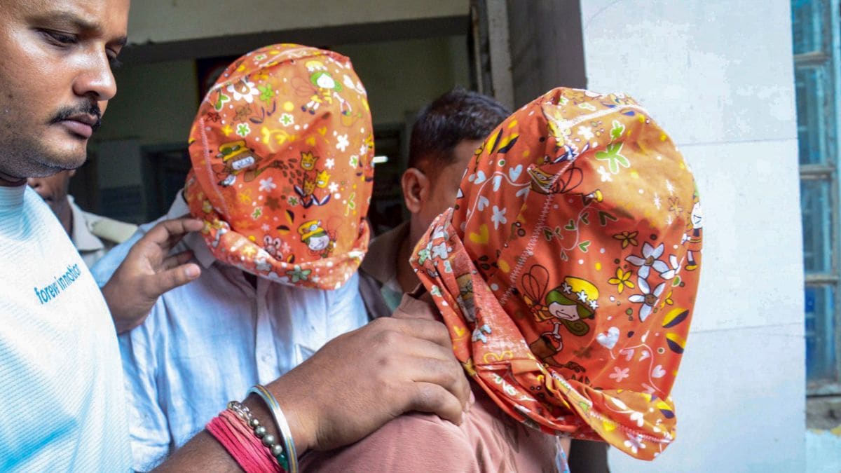 The accused in the alleged gangrape and murder of an 11-year-old girl, being taken by the police to a court on July 6, 2026 | PTI