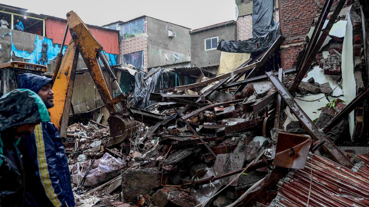 Debris clearance work underway after a three-storey chawl (row tenement) collapses in Mumbai's Mankhurd area following heavy rains on Sunday night, leaving six people dead | PTI