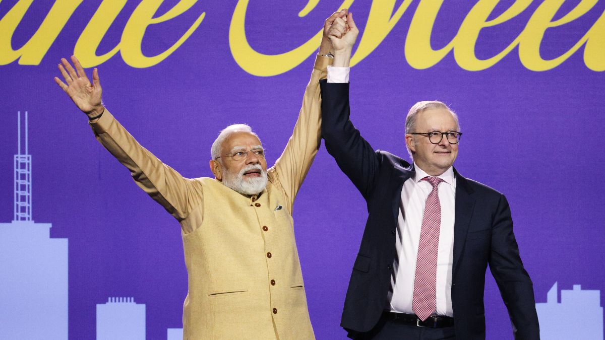 Prime Minister Narendra Modi and Australian Prime Minister Anthony Albanese, right, react following their speeches during a community event in Melbourne, Australia | AP