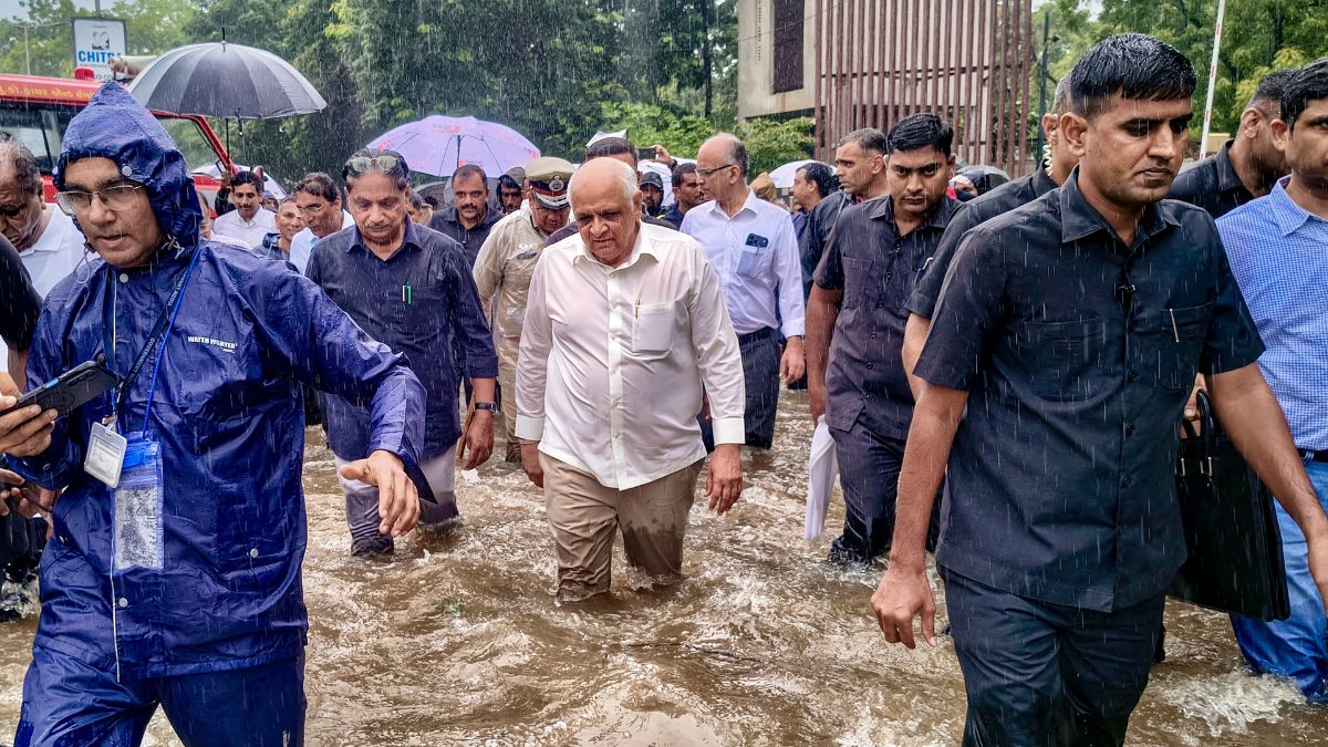 Gujarat Chief Minister Bhupendra Patel along with state Minister Rushikesh Patel inspect waterlogged areas following heavy rainfall, in Ahmedabad, Gujarat | PTI