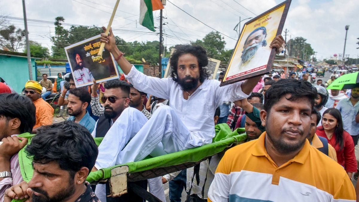 Student leader Devendra Nath Mahto is carried on a stretcher by supporters during a protest march towards the Jharkhand Legislative Assembly in Ranchi on Monday | PTI