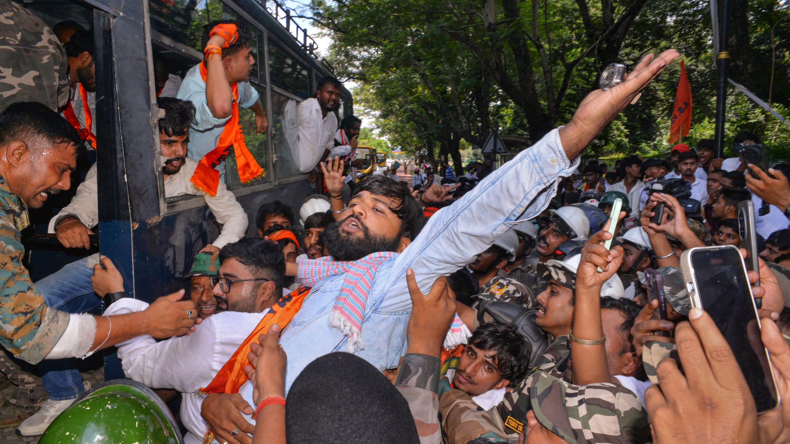 Security personnel detain demonstrators during a 'Vidhan Sabha Gherao' protest march towards the Jharkhand Assembly in Ranchi, Jharkhand | PTI