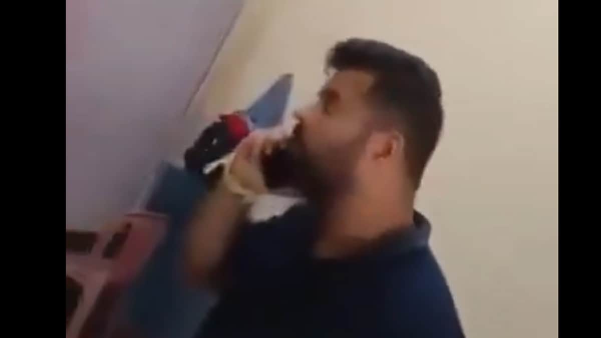 A video surfaced on social media showing Prajwal in casual civilian clothes, apparently speaking to someone on a phone from inside the prison | Screengrab