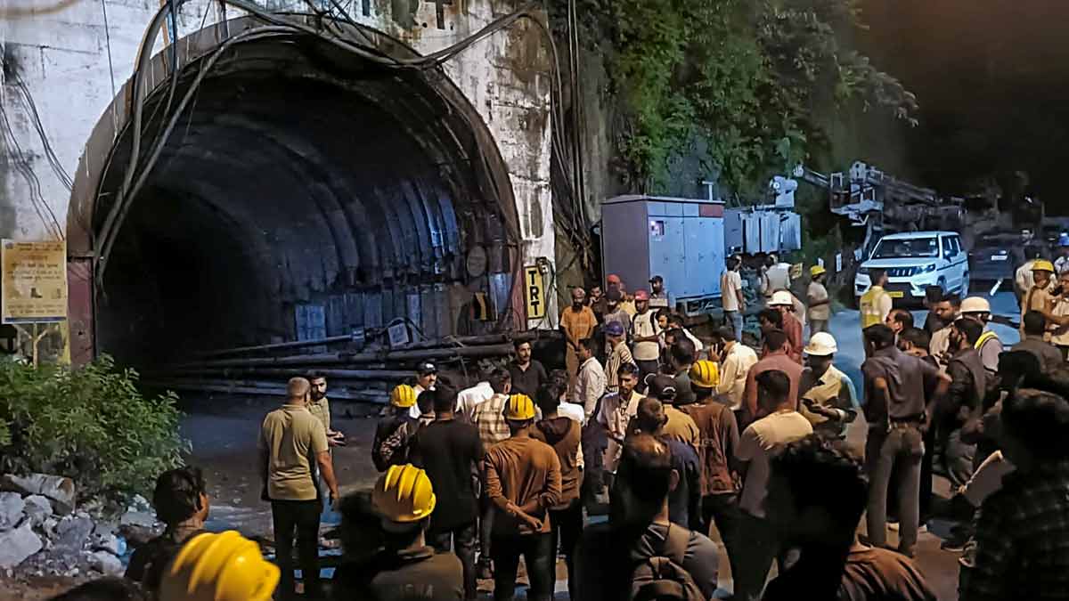People gather after a landslide in an under-construction tunnel of the Vishnugad-Pipalkoti Hydroelectric Project, in Chamoli district, Uttarakhand | PTI