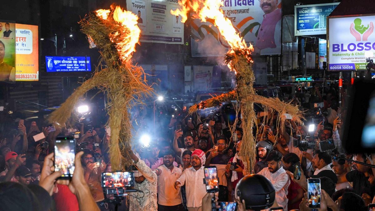 Job aspirants and students burn effigies during a protest against the Jharkhand government demanding a probe into alleged recruitment exam irregularities conducted by the JPSC and JSSC, at Albert Ekka Chowk, in Ranchi on August 16, 2026 | PTI