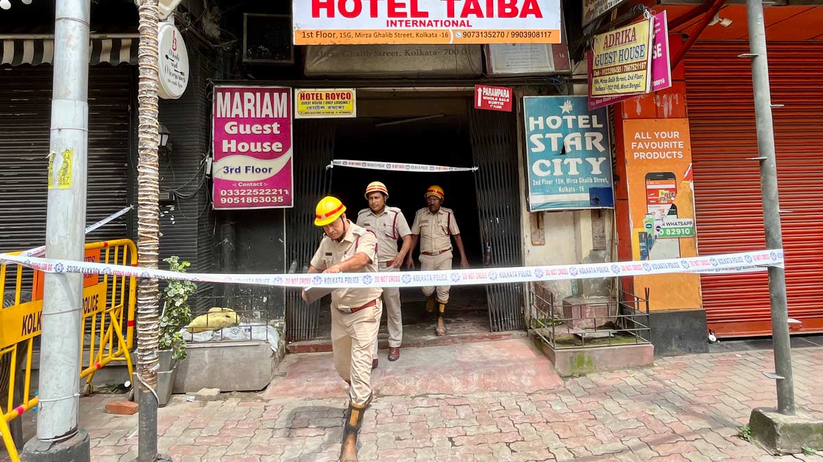 Fire brigade personnel coming out of a building where a fire broke out on Wednesday morning, in Kolkata | Salil Bera