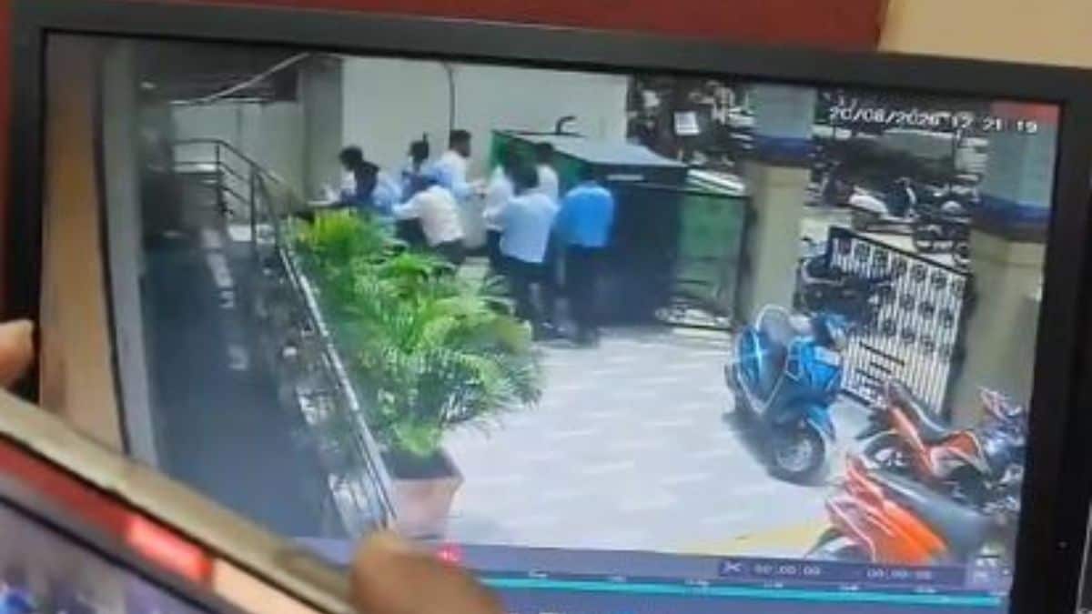 Screengrab from the CCTV footage showing employees rushing after Manas shot his wife Divya Mishra | x 