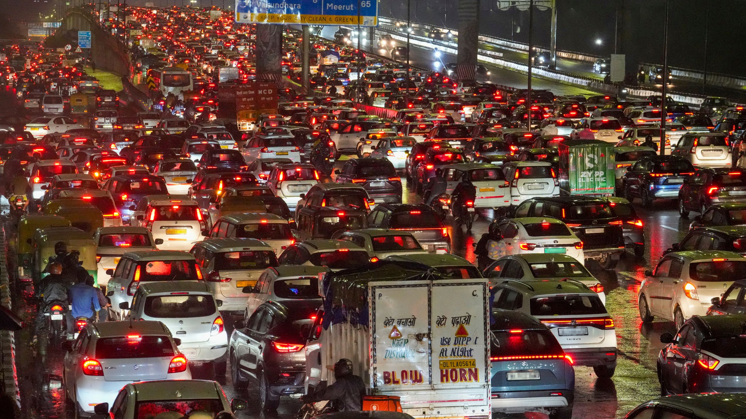 Vehicles stuck in traffic following rainfall, in New Delhi | PTI