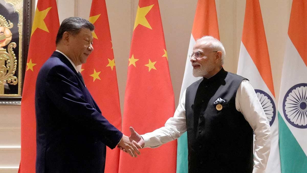 Prime Minister Narendra Modi shakes hands with Chinese President Xi Jinping on the sidelines of the BRICS Summit in New Delhi | Reuters