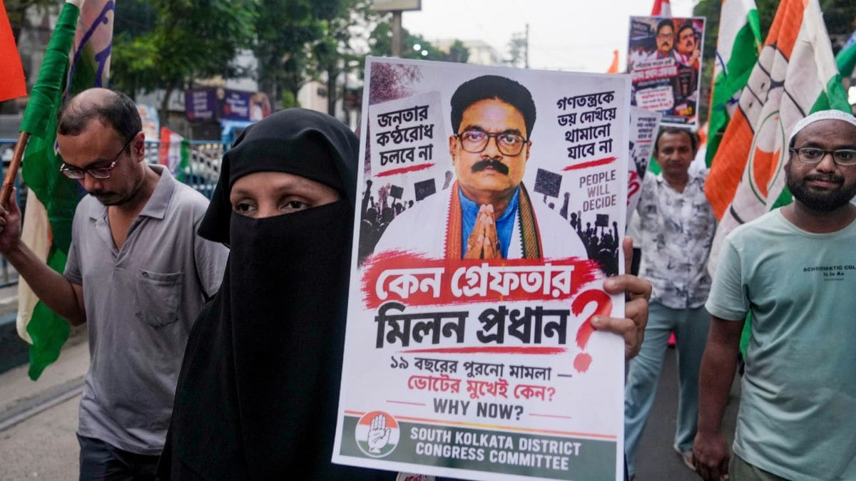 Congress party workers participate in a protest rally against the arrest of party candidate Milan Pradhan for the Nandigram Assembly by-election, in Kolkata, West Bengal | PTI