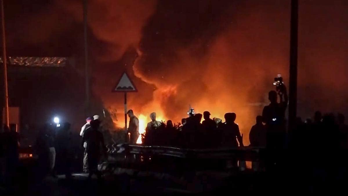 Smoke billows from a fire during a protest by students at the Lovely Professional University (LPU) campus, in Phagwara, Punjab | PTI