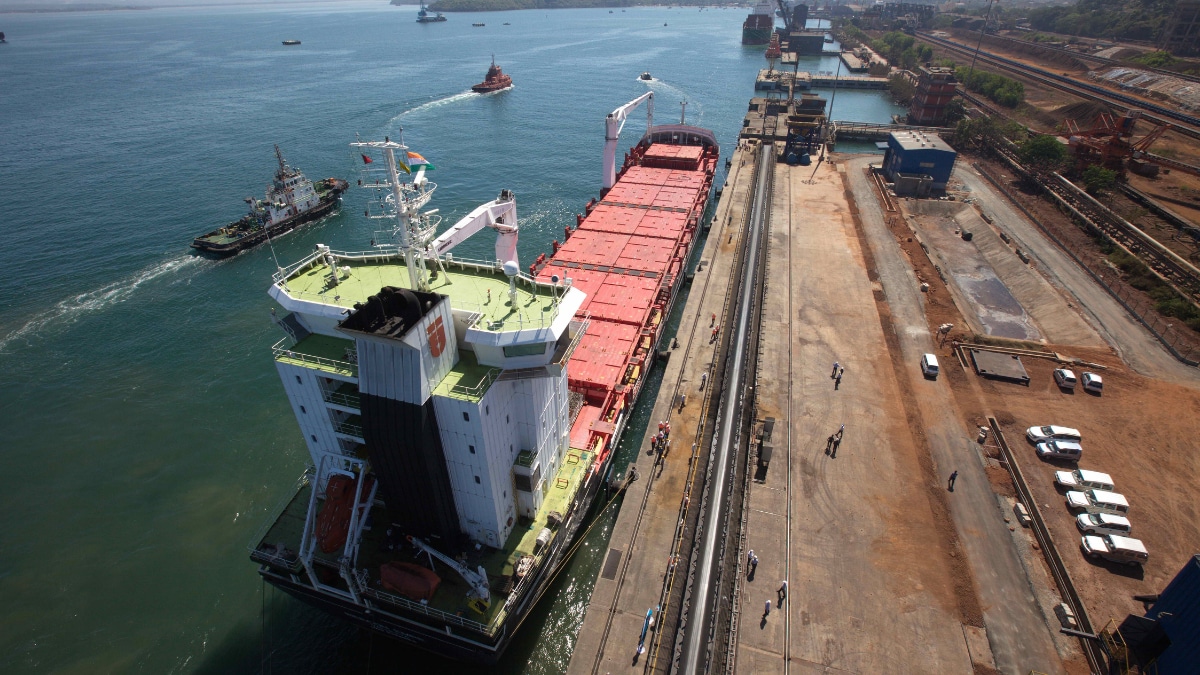 An overhead view of a bulk carrier docked at the Adani Mormugao Terminal of the Mormugao Port in Goa