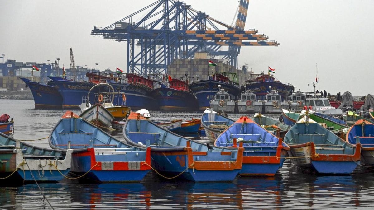A number of fishing boats anchored, with the Vizhinjam Port dominating the background, in Thiruvananthapuram, Kerala | PTI