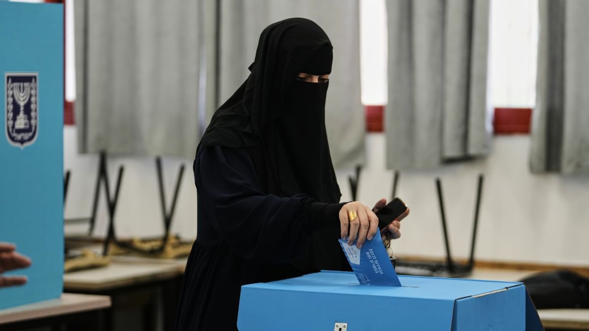 A Palestinian citizen of Israel casts her ballot in the country's general election at a polling station in Umm al-Fahm, Israel, Tuesday, Oct. 27, 2026 | AP