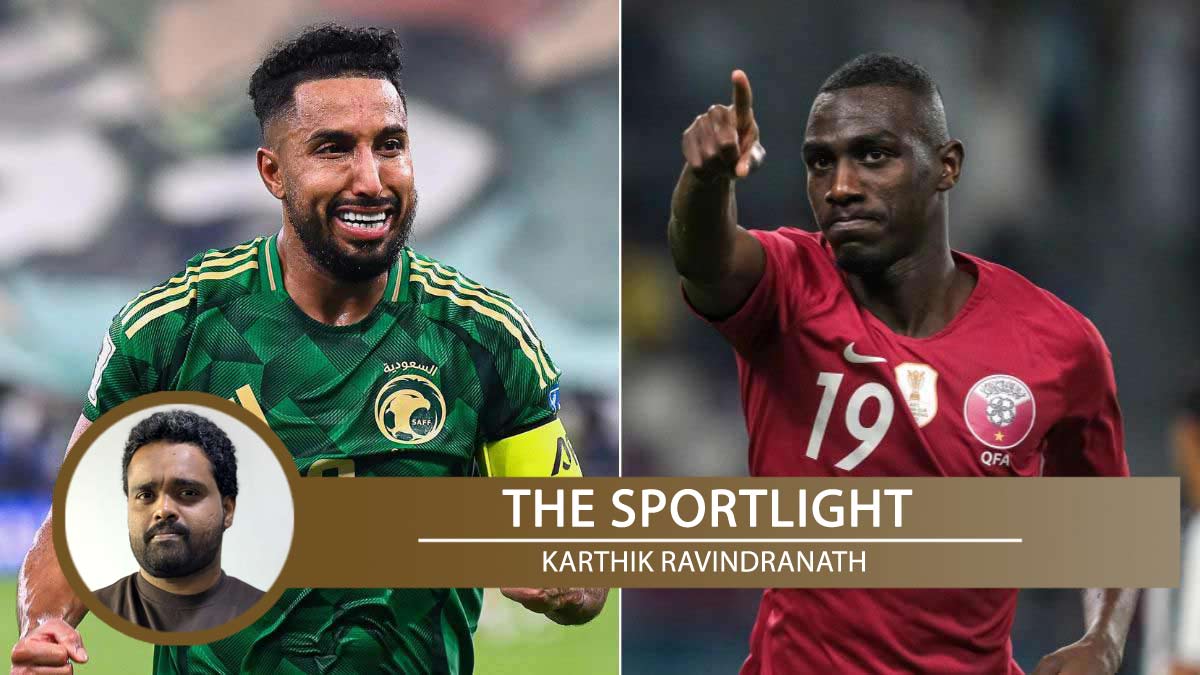 Saudi Arabia's Salem Al-Dawsari (left); Qatar's Almoez Ali