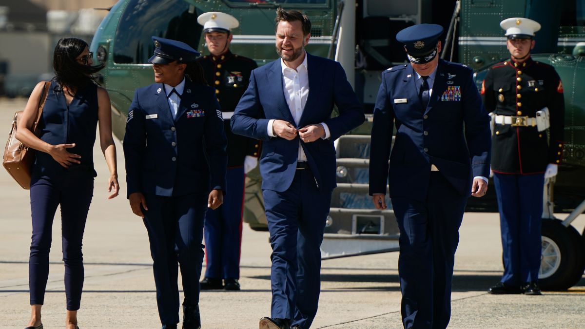 Vice President JD Vance, center, and second lady Usha Vance, left, walk from Marine Two as they arrive at Joint Base Andrews, Md. | AP 