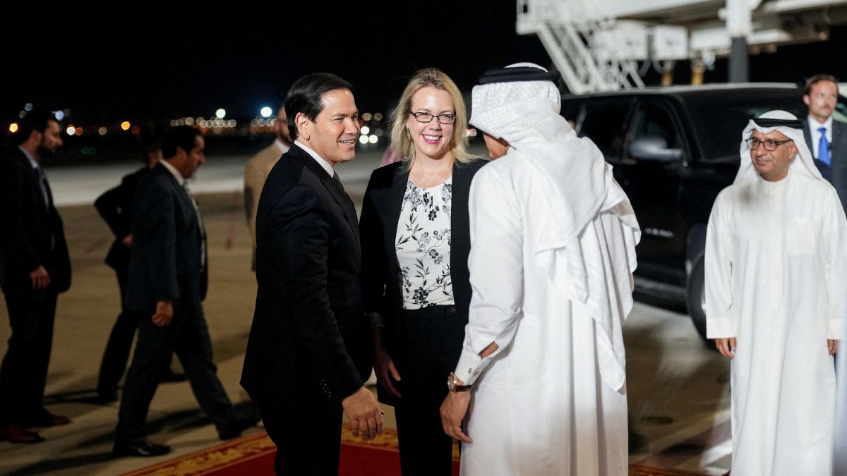 Bahrain's Foreign Minister Abdullatif bin Rashid Al Zayani and U.S. Ambassador to Bahrain Stephanie Hallett greet U.S. Secretary of State Marco Rubio upon arrival at Bahrain International Airport | Reuters 