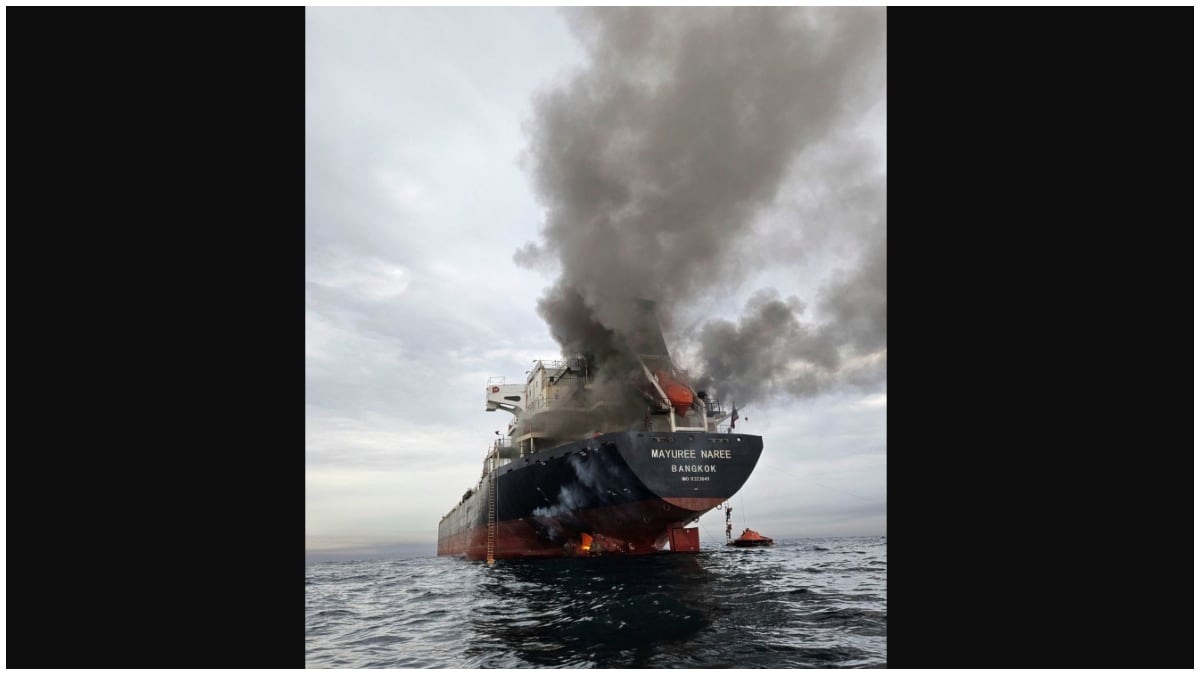 Smoke billows from the Mayuree Naree, a Thailand-flagged bulk carrier, after it was hit by a projectile in the Strait of Hormuz | AP