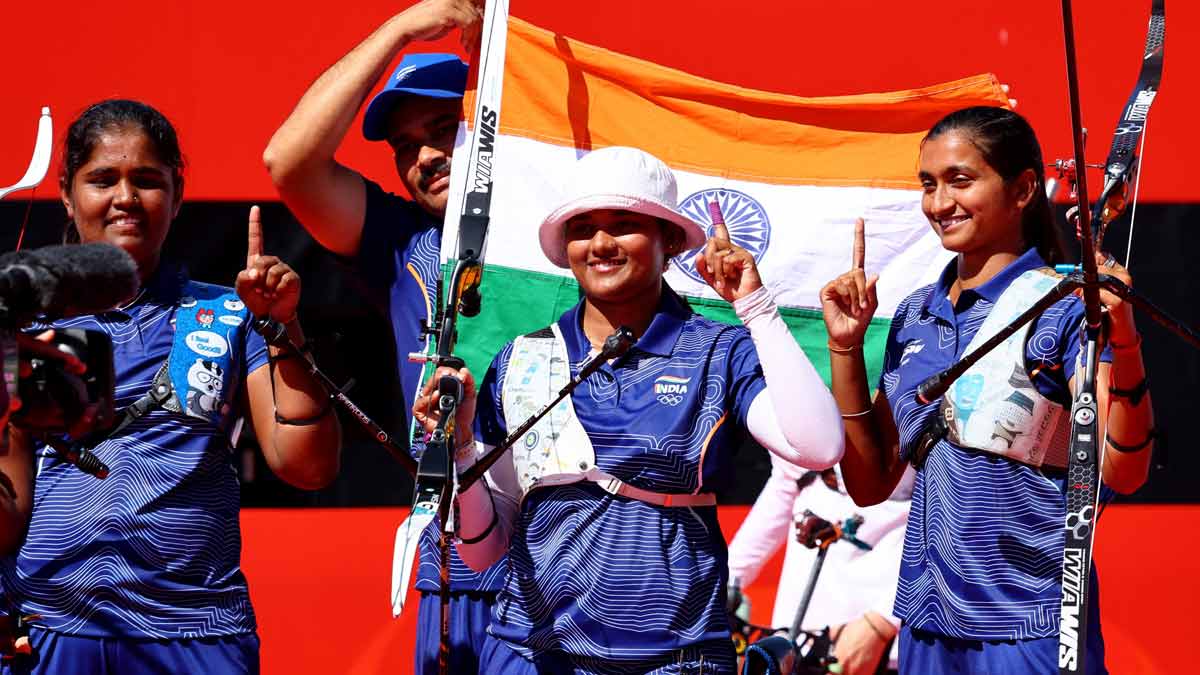 India's Kumkum Anil Mohod, Ankita Bhakat and Kirti Sharma celebrate after winning the gold medal in women's recurve at the Asian Games | Reuters