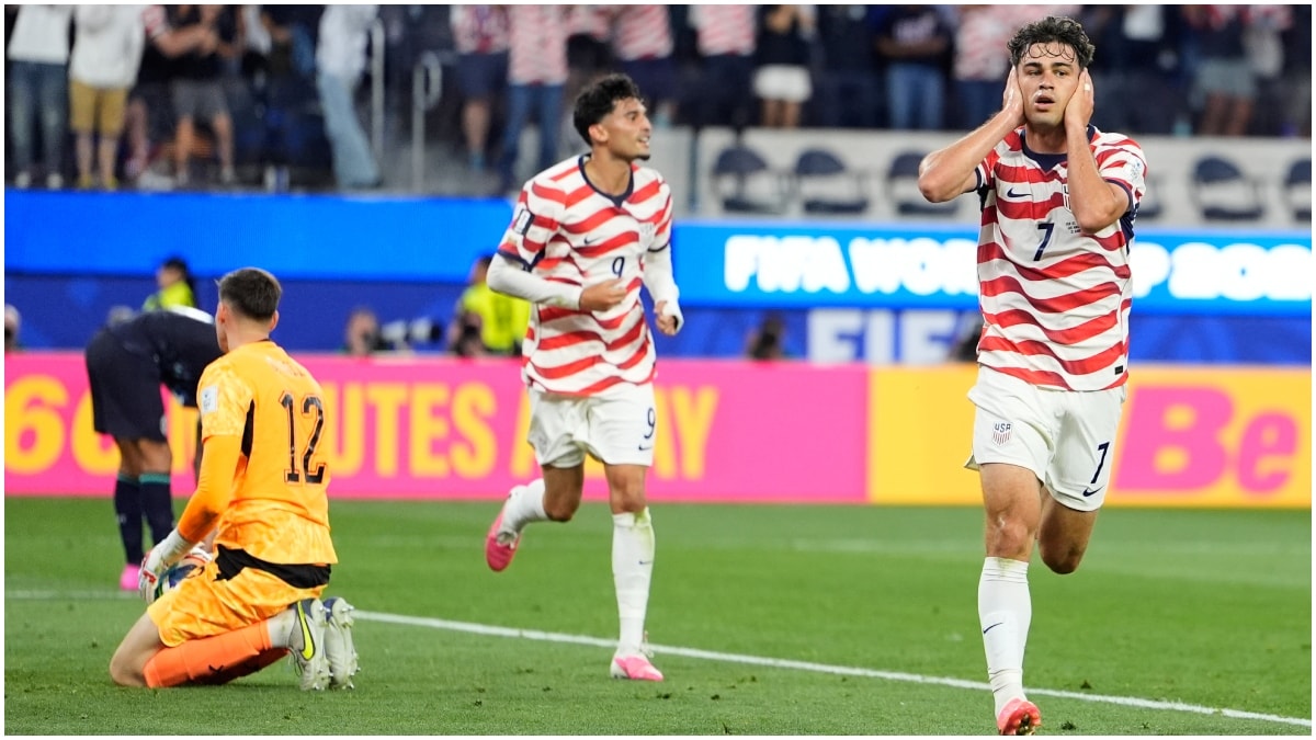 Giovanni Reyna (R) reacts after scoring USA's fourth goal against Paraguay | AP