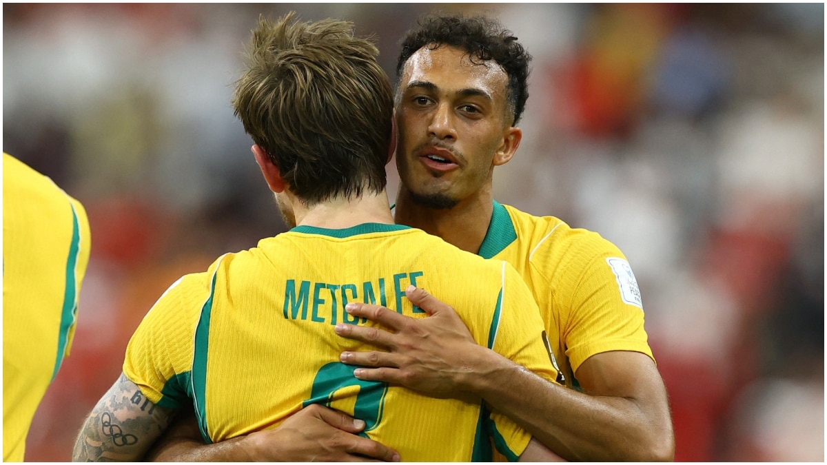 Australia's Connor Metcalfe celebrates scoring their second goal with Nishan Velupillay | Reuters