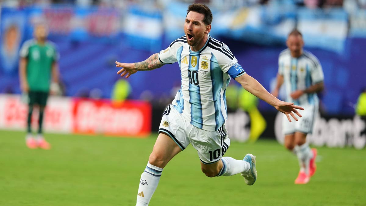 Argentina's Lionel Messi (10) celebrates after scoring the opening goal during the World Cup Group J soccer match against Algeria | AP