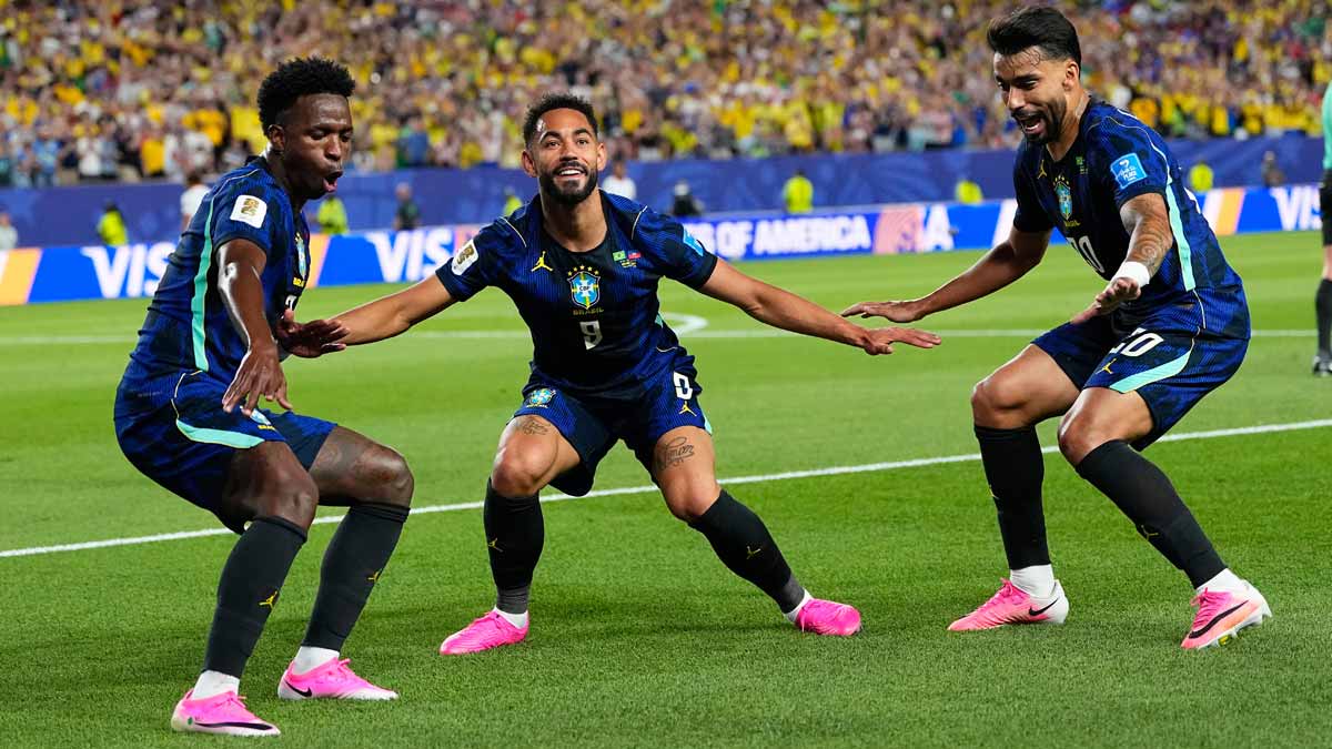 Brazil's Matheus Cunha (9) celebrates after scoring his side's second goal with Brazil's Vinicius Junior (7) and Lucas Paqueta (20) during the World Cup Group C match against Haiti in Philadelphia | AP
