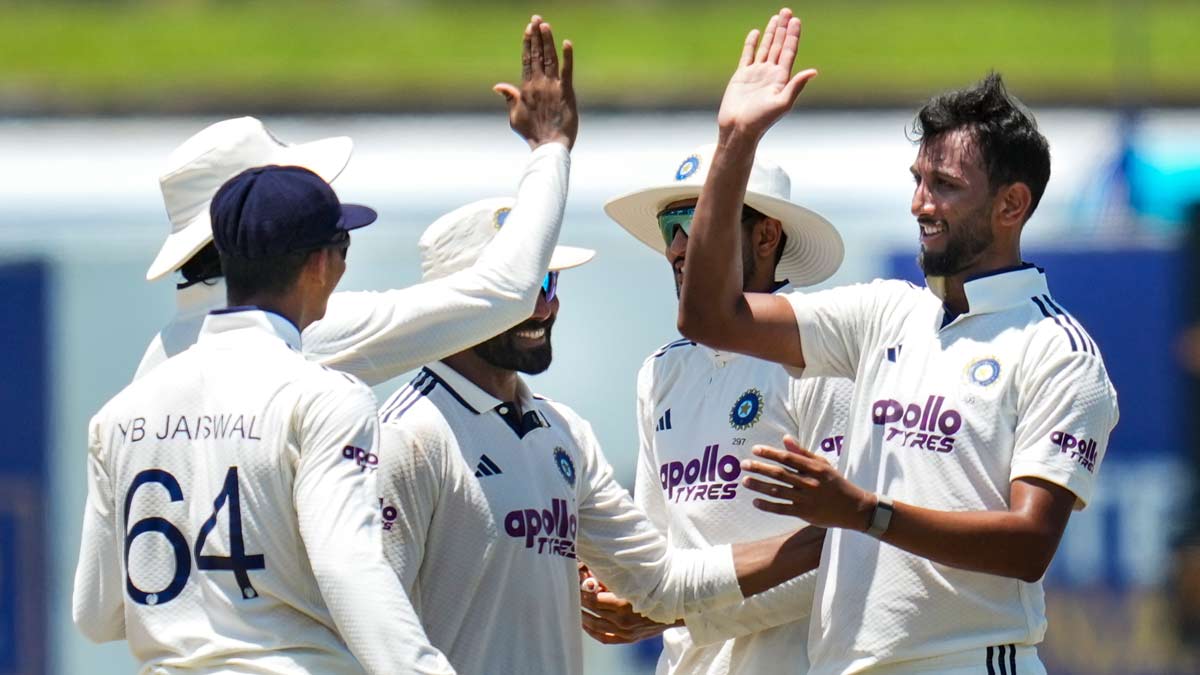 Prasidh Krishna (right) celebrates with teammates after dismissing Sri Lanka's Niroshan Dickwella on day five of the first Test match between India and Sri Lanka, in Galle | PTI