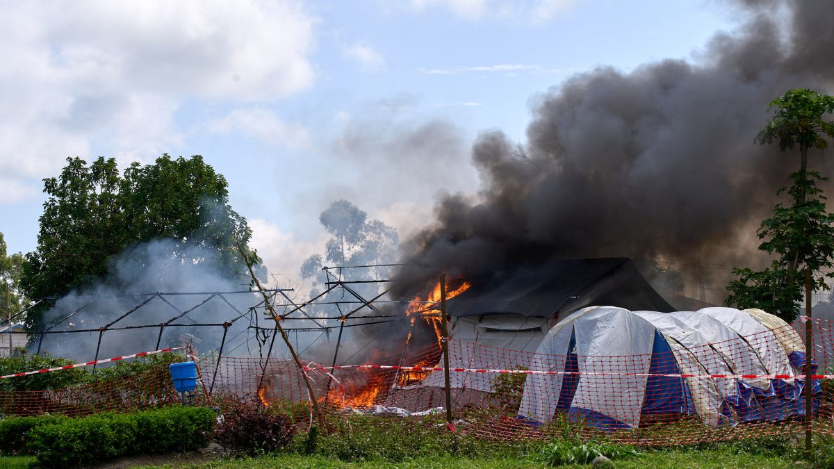Flames and smoke rise from an Ebola treatment center in Rwampara, Congo | AP