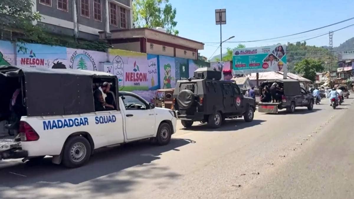 Police officials patrol an area in Muzaffarabad amid the ongoing violence in PoK | PTI