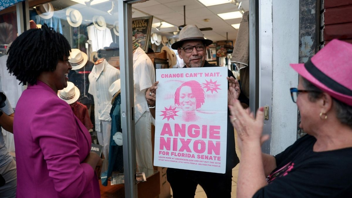 Democratic US Senate candidate, Florida state Rep. Angie Nixon (L) campaigns in the Little Havana neighborhood in Miami, Florida. Nixon faces incumbent Republican US Sen. Ashley Moody in the November 3rd general election | AFP