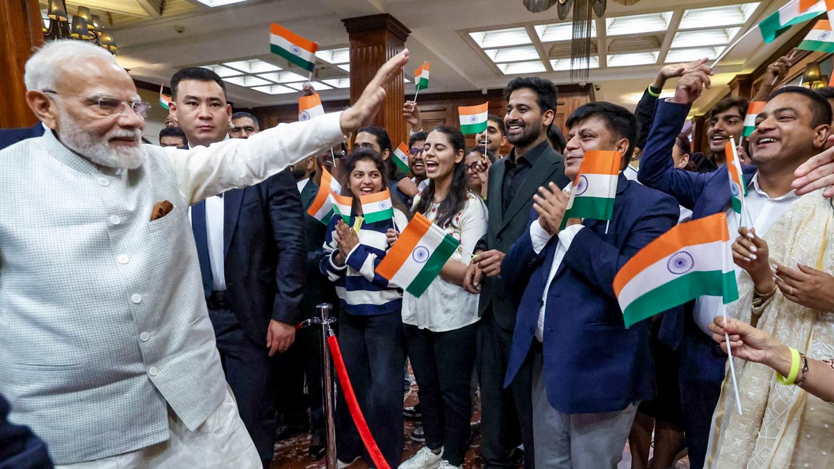 Prime Minister Narendra Modi being greeted by members of Indian community upon his arrival in Bishkek | PTI