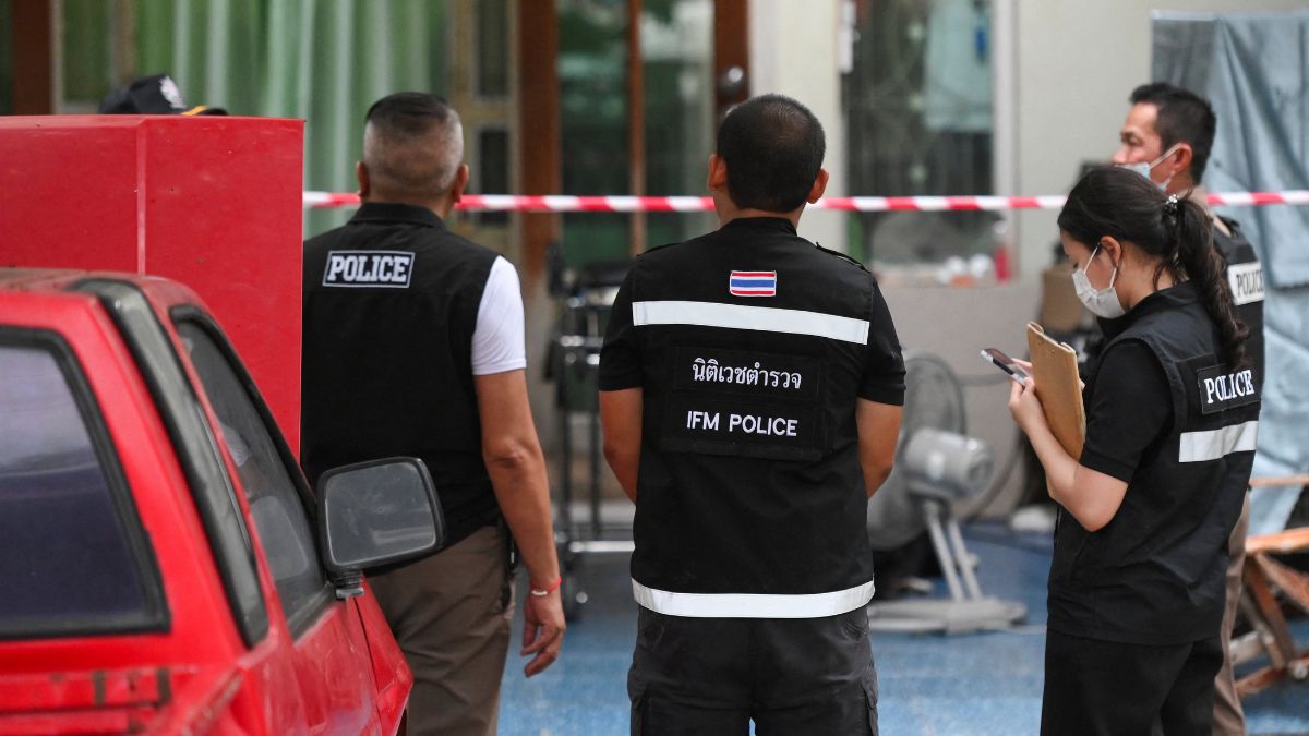 Forensic police experts work at the site of a residence, where a Thai teenager fatally shot his grandparents, before he opened fire at the Debsirin Nonthaburi School in Thailand on August 7, 2026 | Reuters