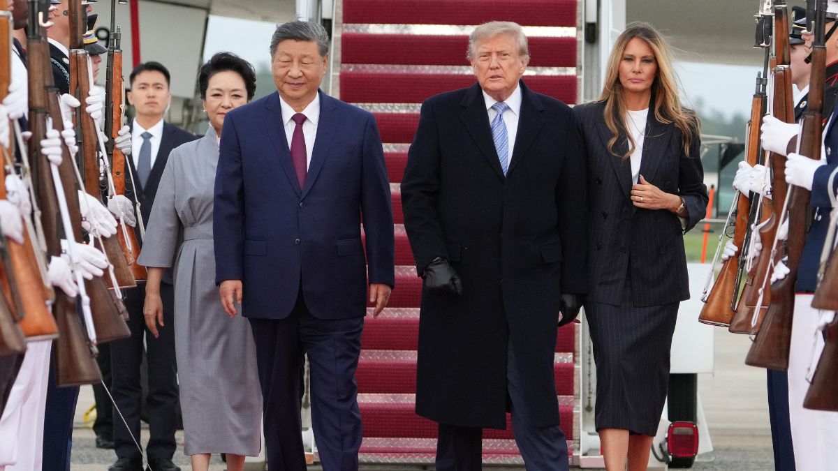 President Donald Trump, first lady Melania Trump, China's President Xi Jinping and his wife Peng Liyuan participate in an arrival ceremony at Joint Base Andrews, Md., Wednesday | AP 