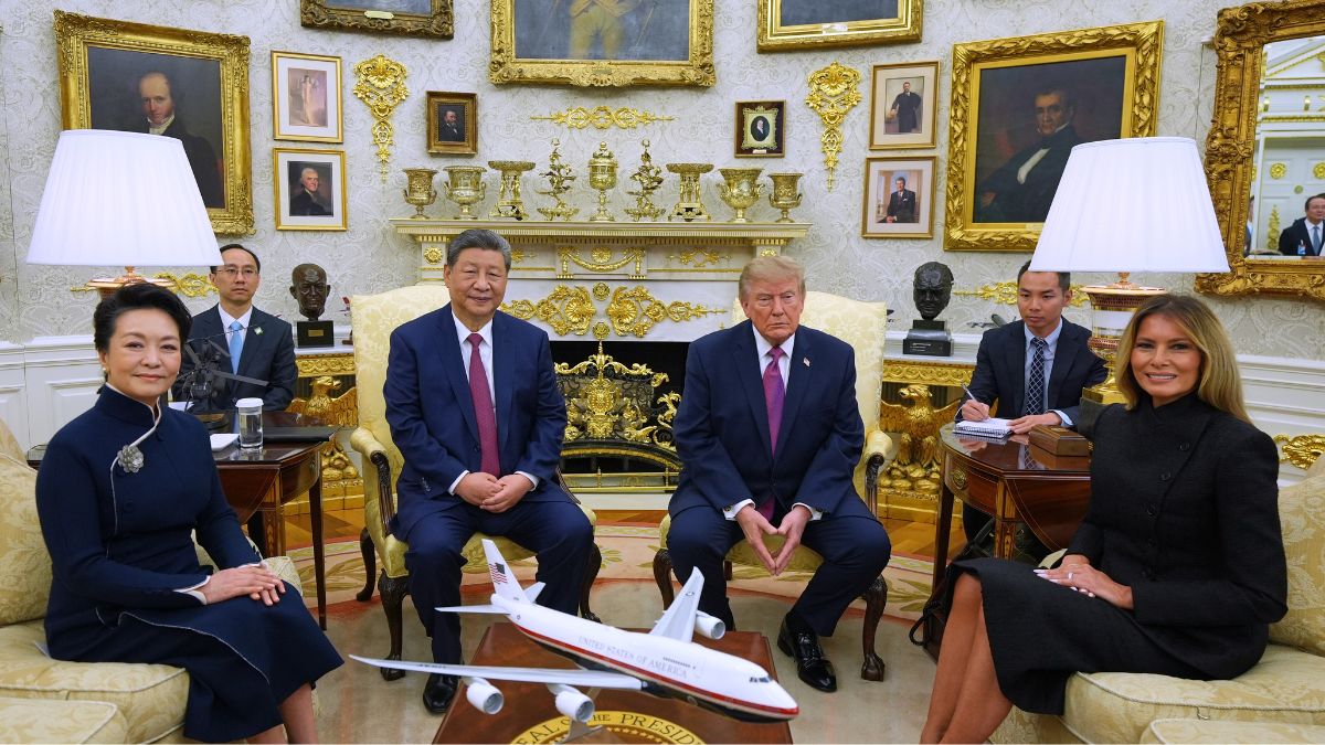 US President Donald Trump, first lady Melania Trump, Chinese President Xi Jinping and his wife Peng Liyuan pose for a photo before a meeting in the Oval Office of the White House | AP