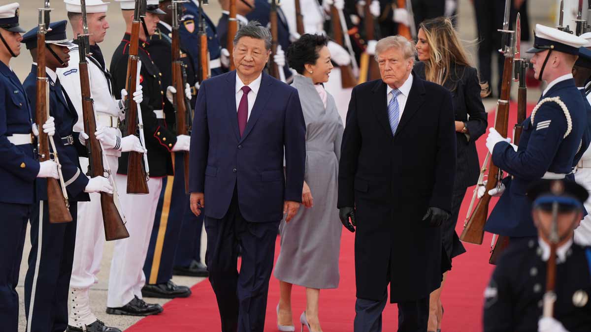 President Donald Trump and first lady Melania Trump greet Chinese President Xi Jinping and his wife Peng Liyuan as they arrive at Joint Base Andrews | AP