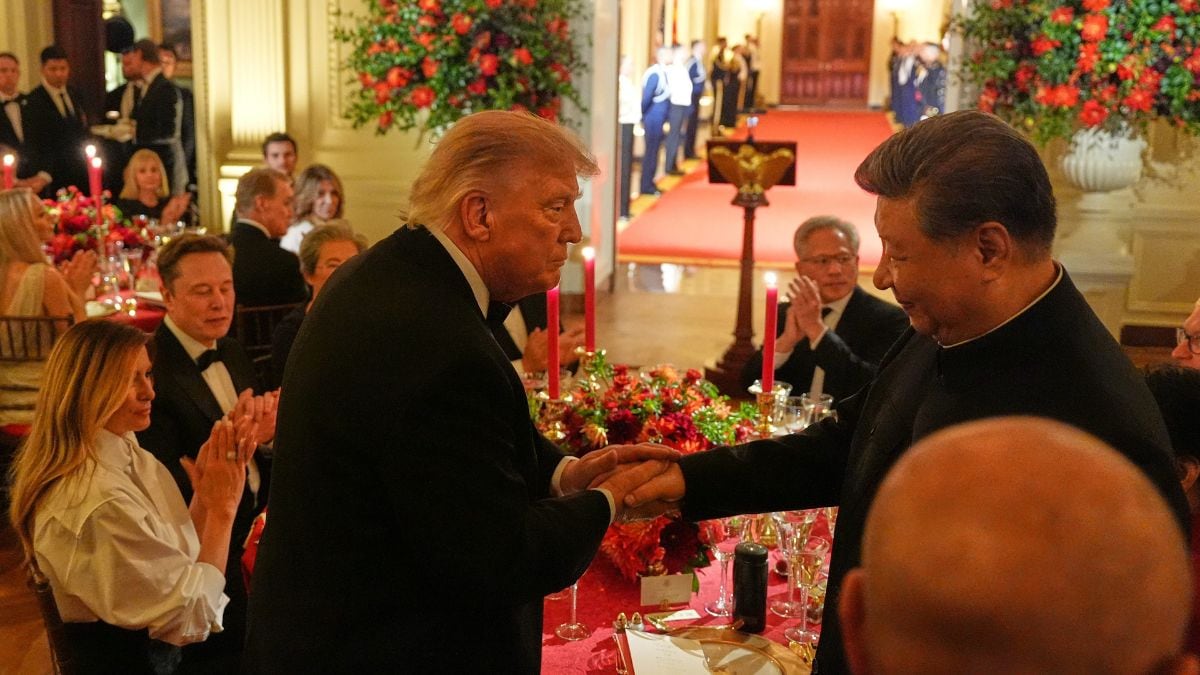 President Donald Trump shakes hands with China's President Xi Jinping in the East Room of the White House during a State Dinner, Thursday | AP 