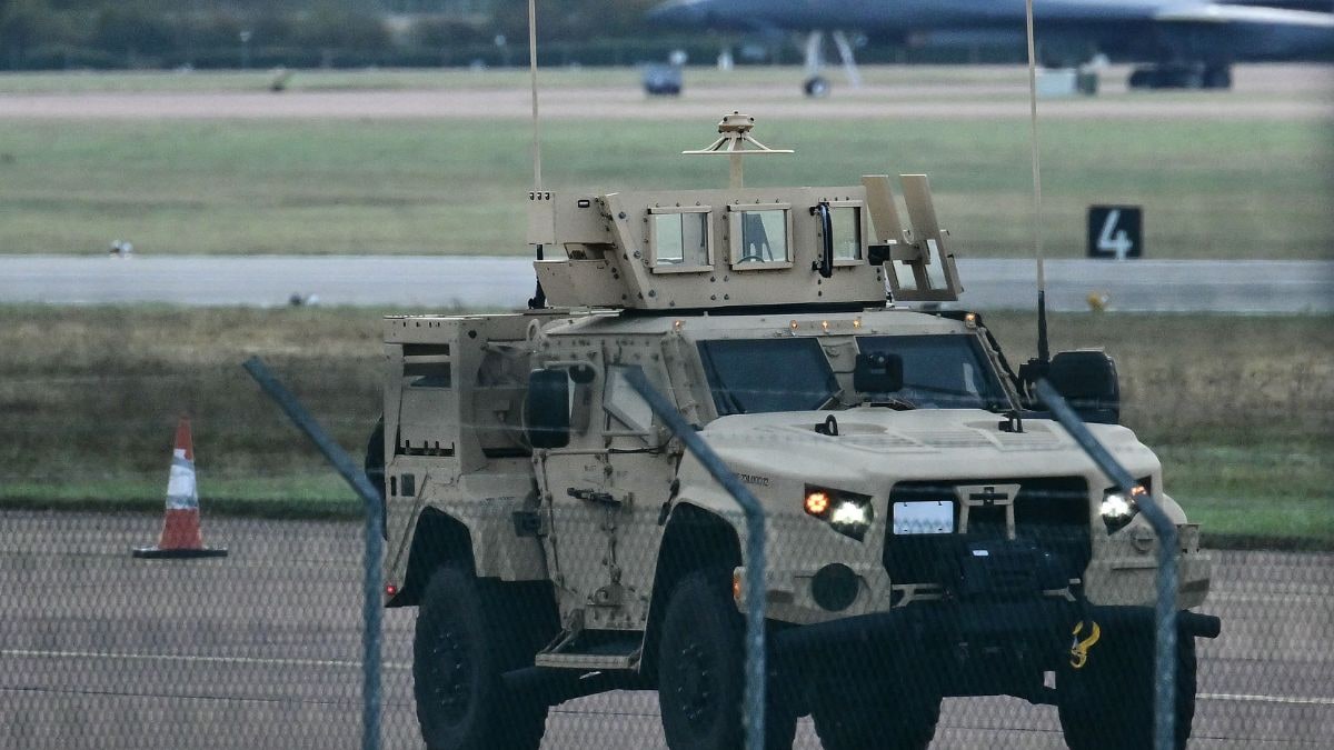 An armoured vehicle patrols the interior at RAF Fairford base in Fairford, south-west England on September 28, 2026, a day after British counter-terrorism police were probing "a major" incident near the base | AFP