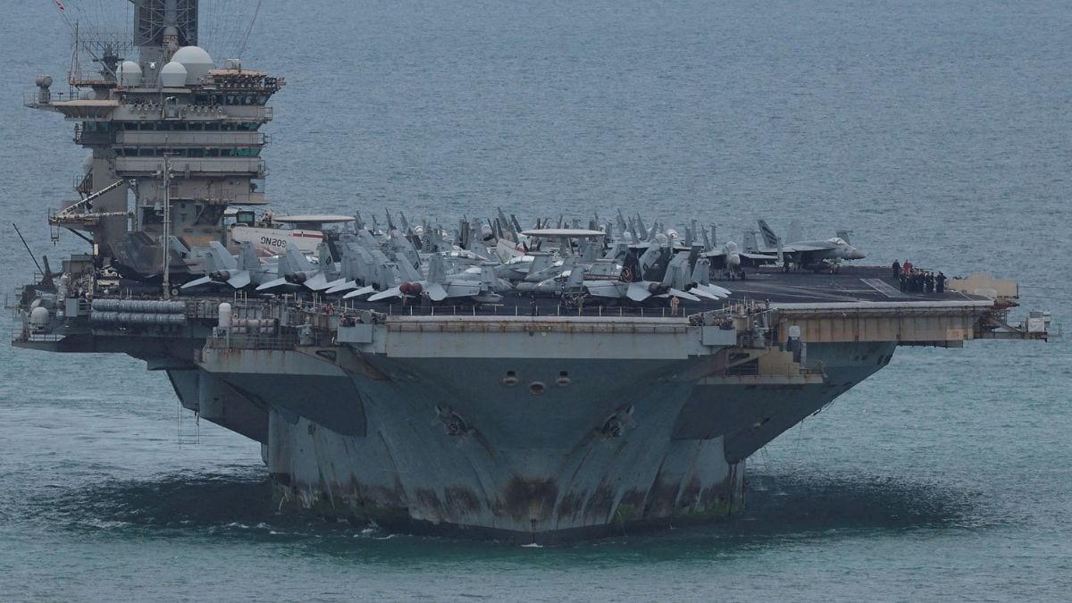 U.S. Navy Nimitz-class aircraft carrier USS Abraham Lincoln sails toward Laem Chabang Port in Thailand before docking for a rest stop | Reuters 