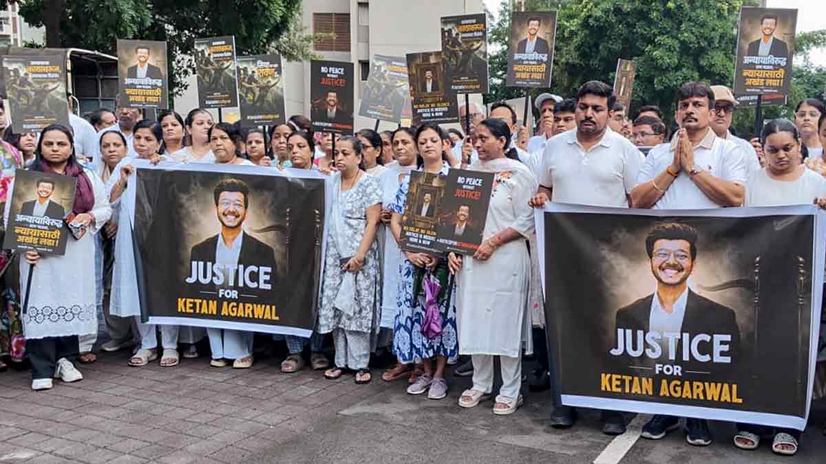 Residents in Pune participate in a silent march and candlelight vigil demanding justice for Ketan Agarwal | PTI