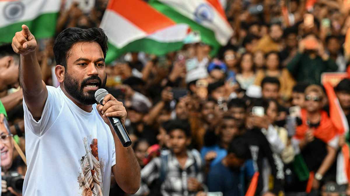 CJP founder Abhijeet Dipke addressing supporters during a protest demanding the resignation of Gyanesh Kumar in Mumbai | AFP