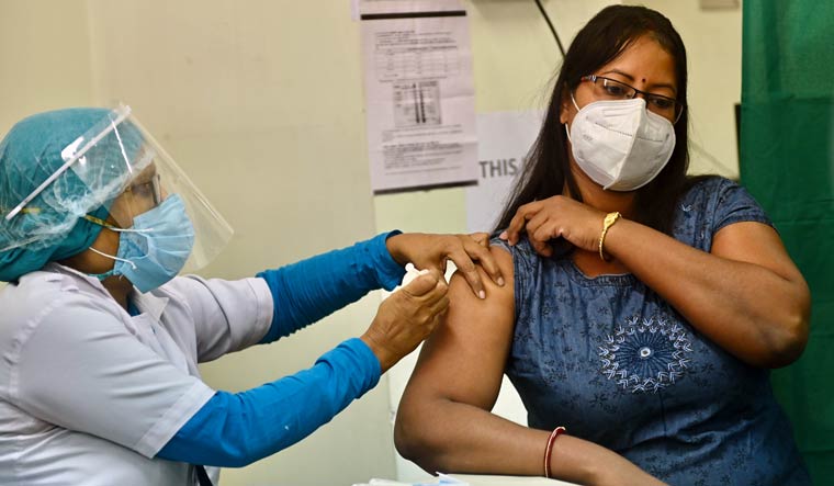 A woman receives a jab of the coronavirus vaccine in Kolkata | Salil Bera