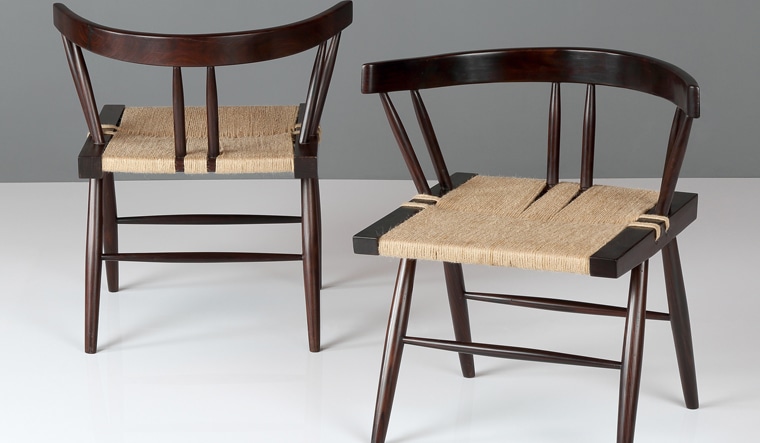 George Nakashima's grass-seated chairs on display