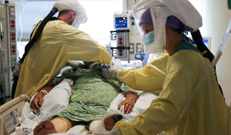 Warriors at work: A Covid-19 patient being treated in a California hospital | AFP
