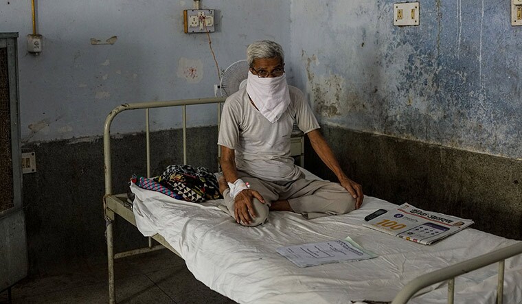 Need for upgrade: A patient at a hospital in Kanpur. Better infrastructure in health centres has been a constant demand of doctors | AFP
