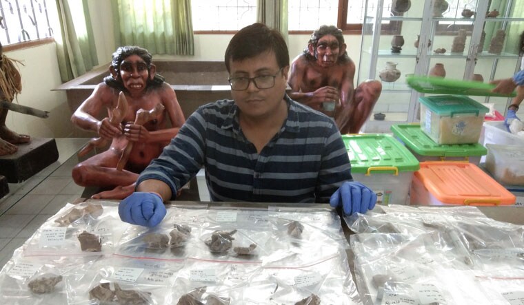 Driven by DNA: Dr Niraj Rai with samples of excavated remains