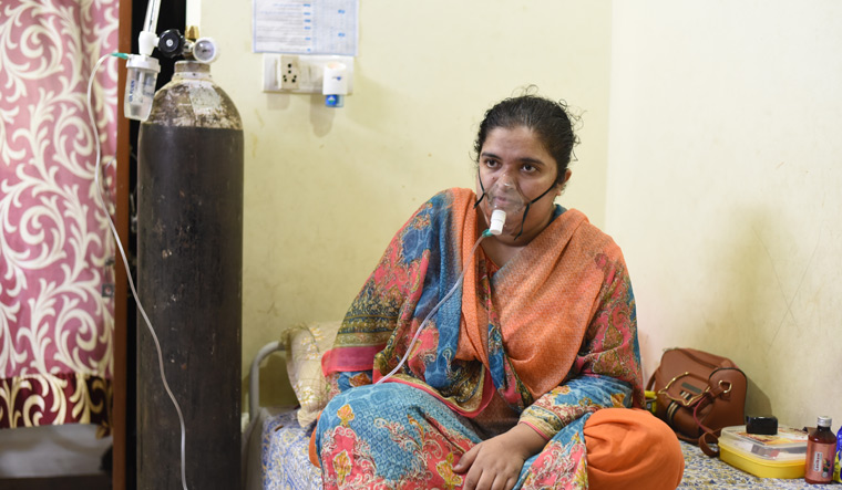 Talking helps: Rakshina Khan recovering at her Bhopal home after a 50-day hospital stay. She initially felt lonely at the hospital. It was only after  the clinical psychologist visited her that she found the will to fight Covid-19 | Mujeeb Faruqui