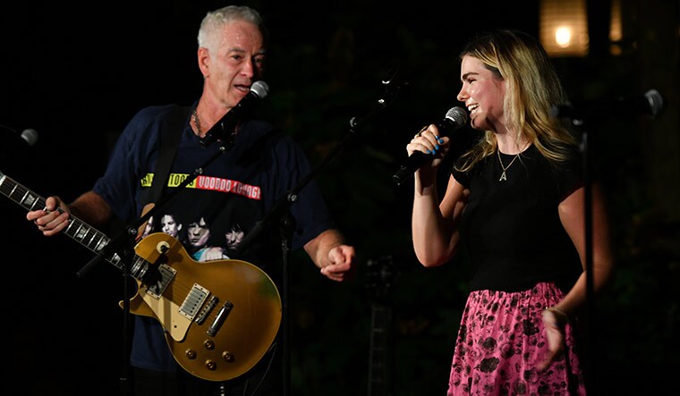 Family man: (Left) John McEnroe and his daughter, Ava, performing in New York | Getty Images