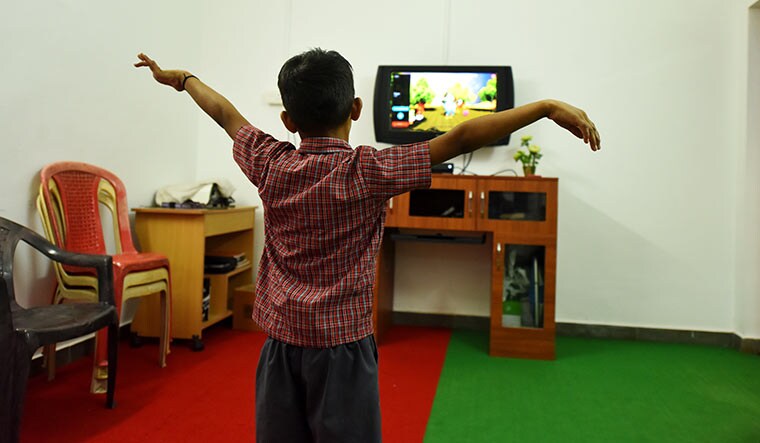 Play time: Devesh S. undergoes VHAB  therapy at Adarsh Rehabilitation Centre | Vishnudas K.S.